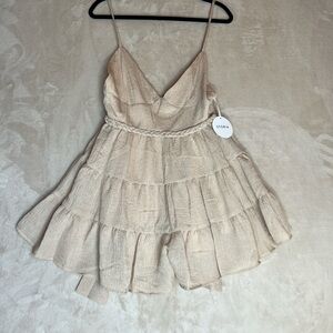 Storia Tan romper with braided belt  in a Size Large tie back New